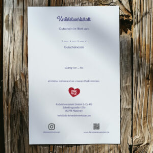 Foto vom Gutschein auf einem Tisch